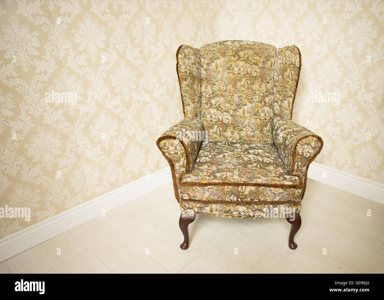 Stylish gold vintage armchair Stock Photo Alamy