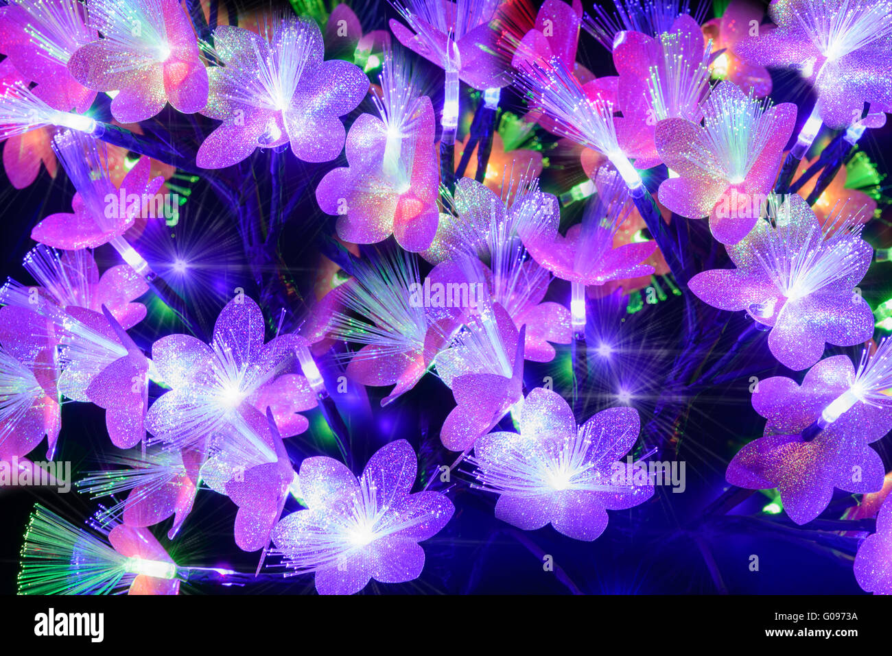 Glowing abstract flowers on a dark background Stock Photo