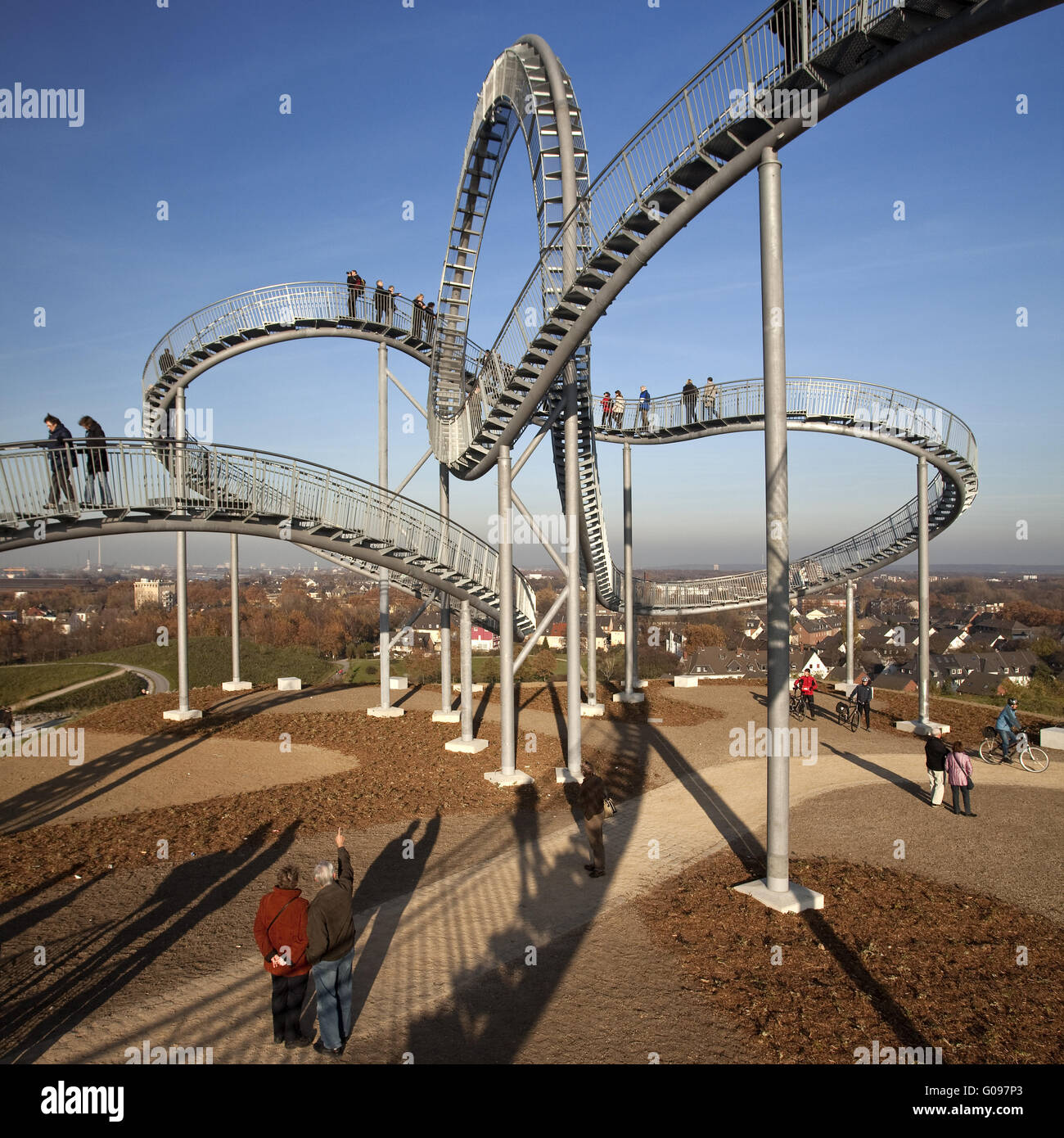 Persons on the landmark Tiger and Turtle, Duisburg Stock Photo