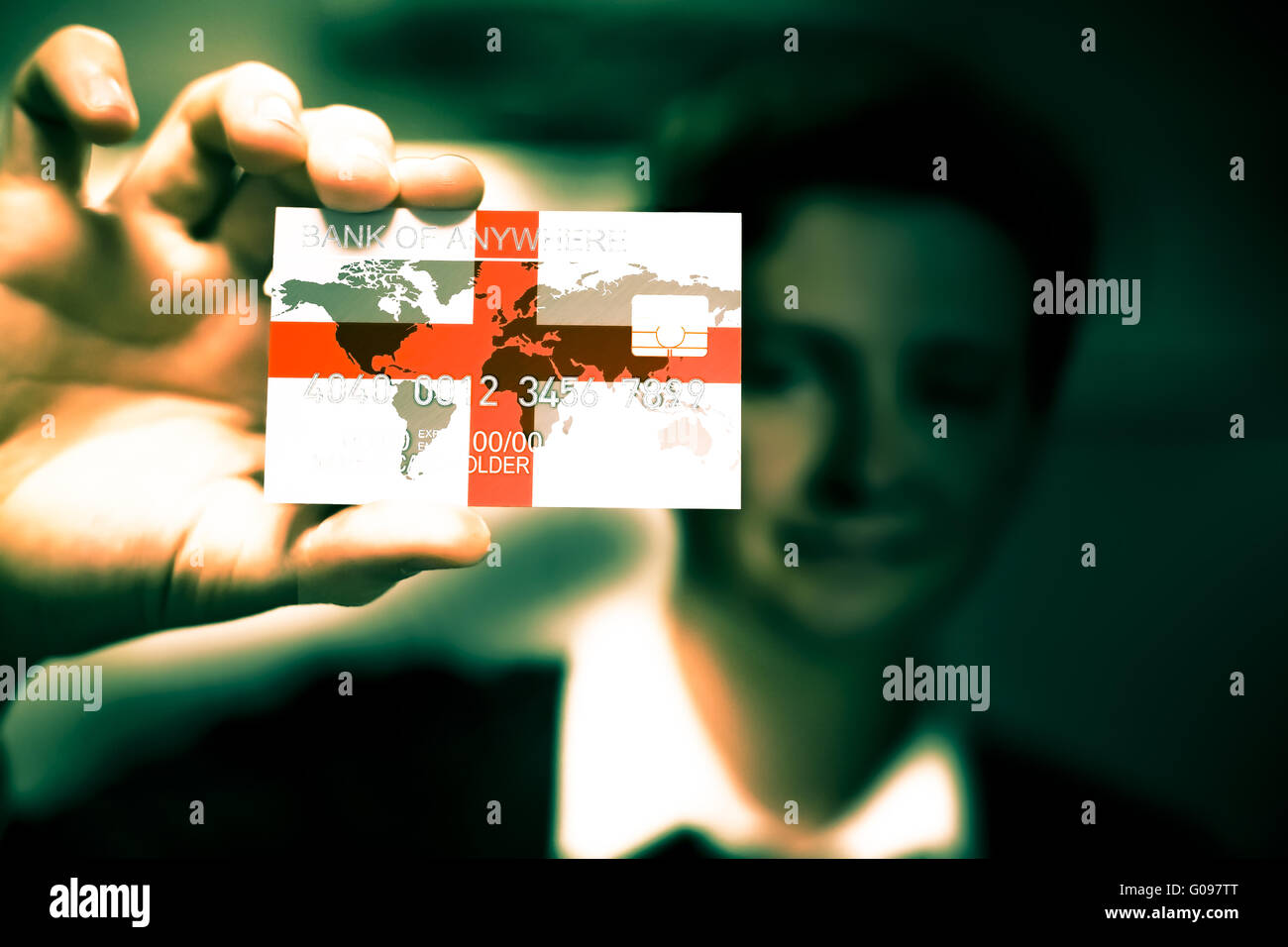 Close up to credit card in man hand, flag of England Stock Photo