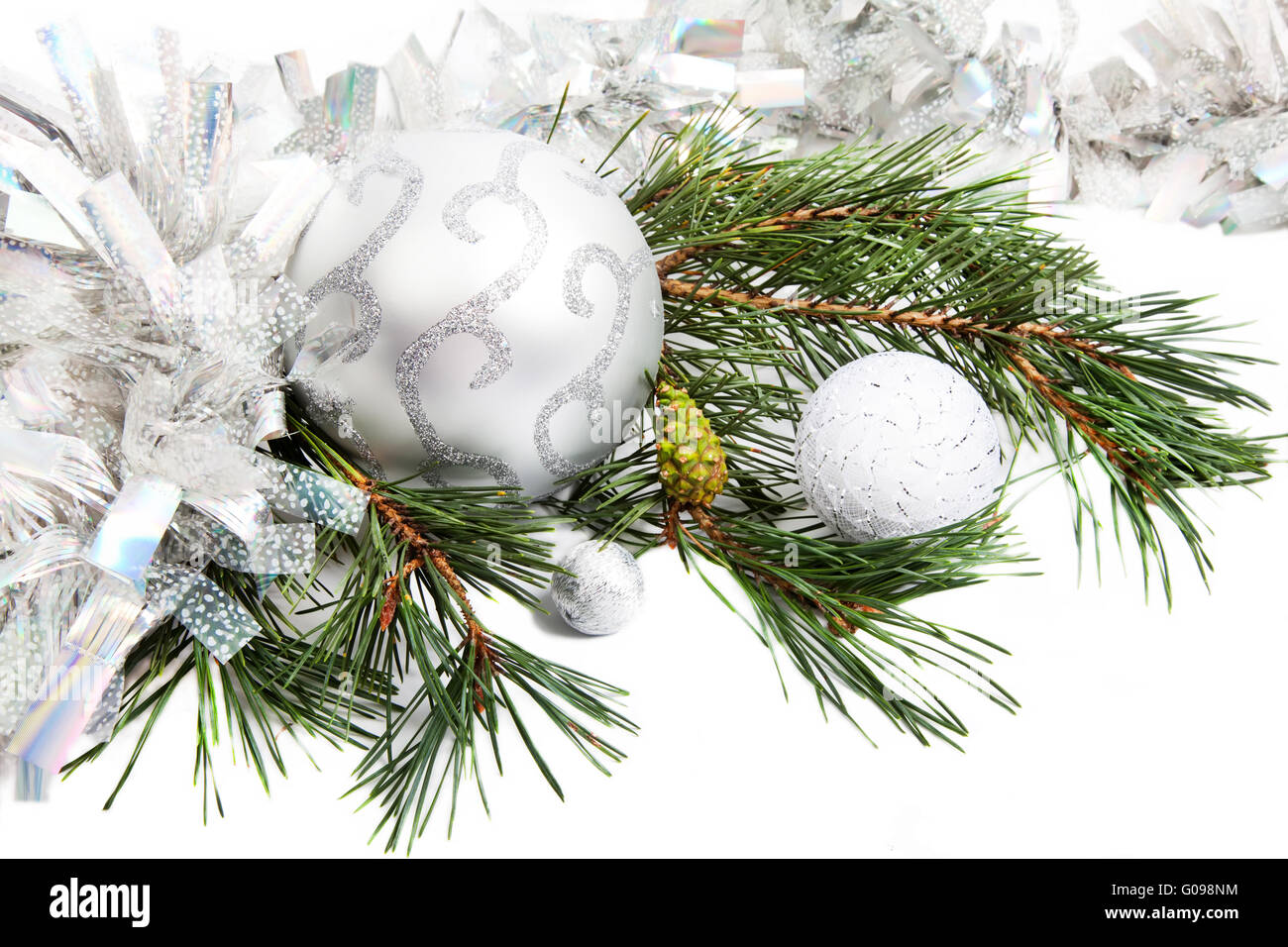 New Year composition with fir branch, tinsel and balls Stock Photo
