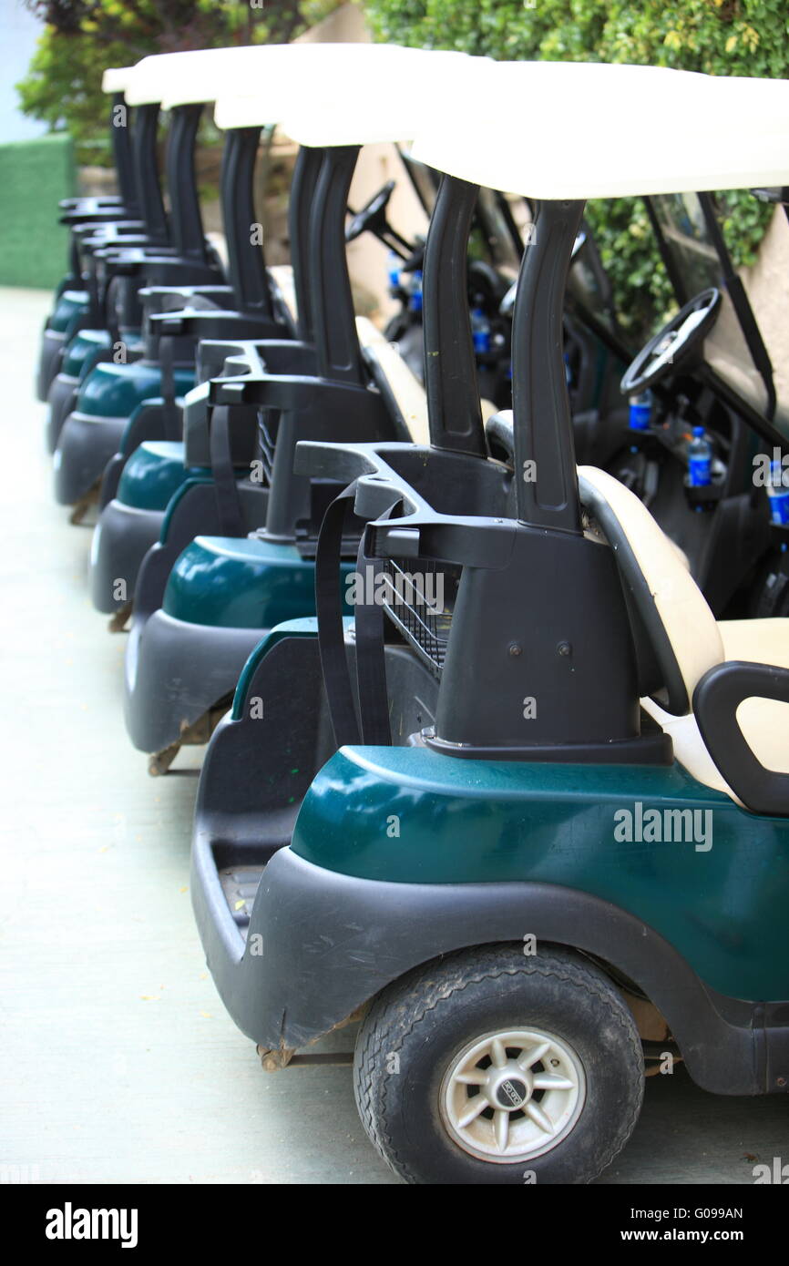 High quality modern golf carts aligned Stock Photo