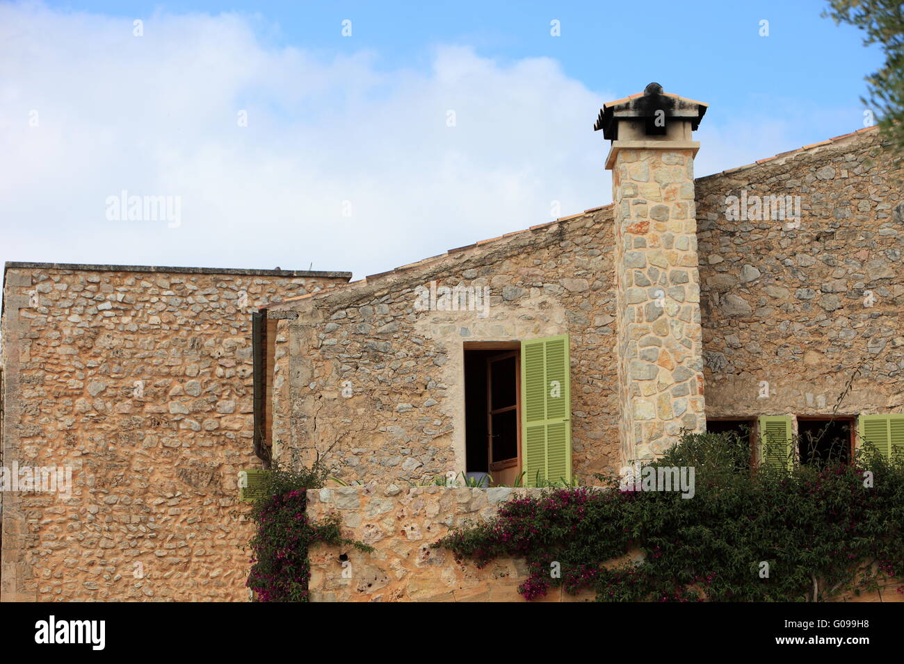 Stone building with chimney Stock Photo