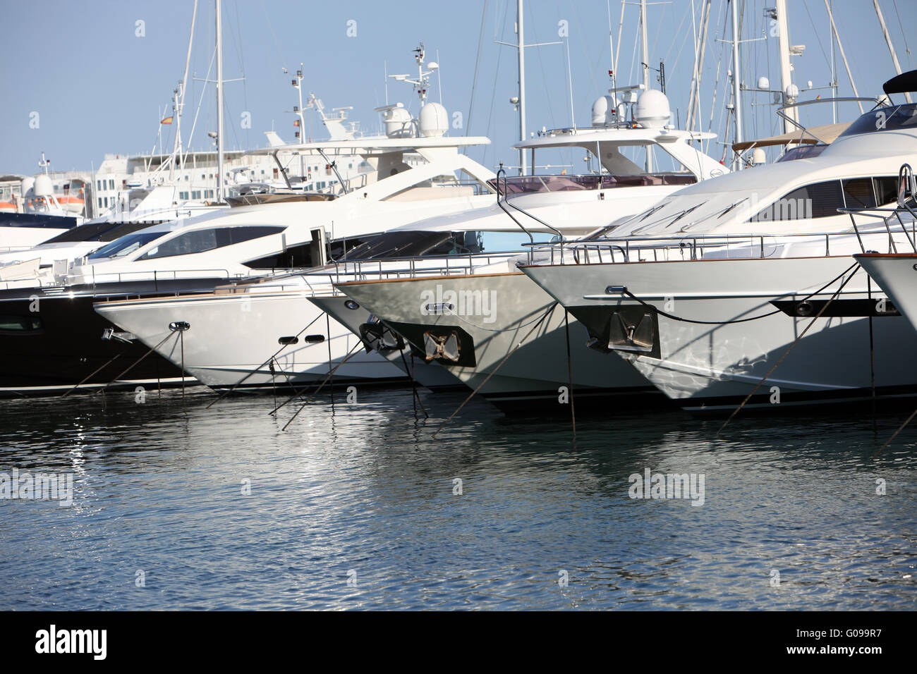 Row of luxury motorised yachts Stock Photo