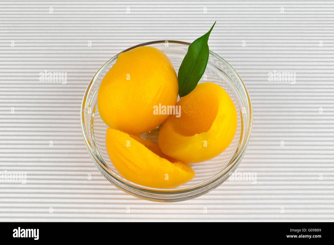 Canned Yellow Peach. Stock Photo