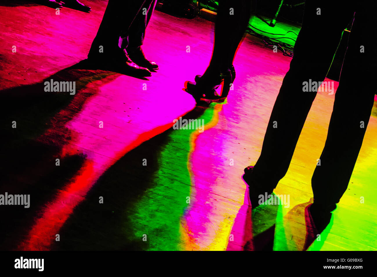 Dance Floor In Bright Colors With Black Silhouette Stock Photo