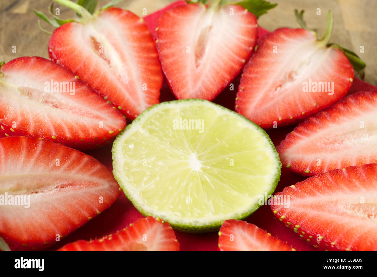 Strawberries and lime Stock Photo Alamy