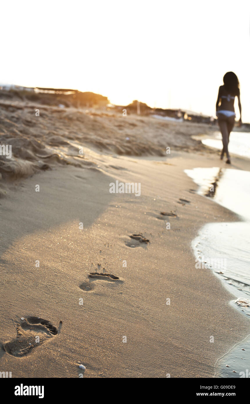 Walking on the sand Stock Photo Alamy