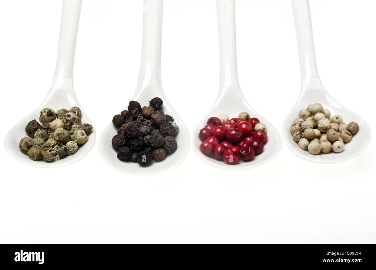 Four different kinds of peppercorns Stock Photo Alamy
