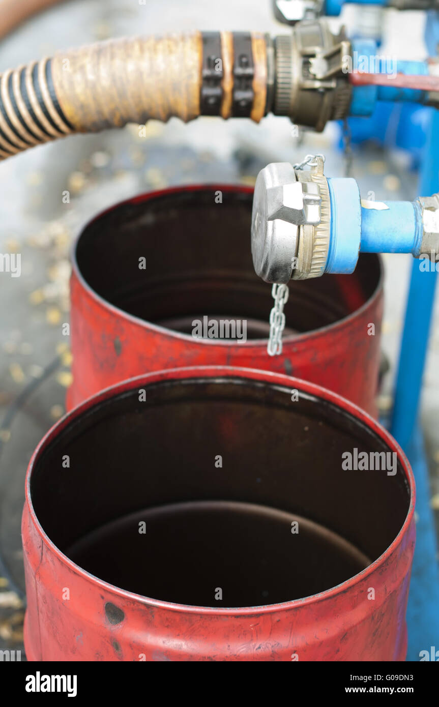 Truck Hoses for fuel station, pumps and oil barrels Stock Photo Alamy