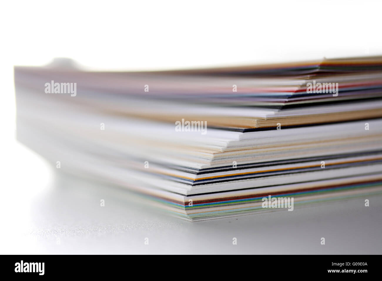 separating stacked sheets to organize a folder Stock Photo