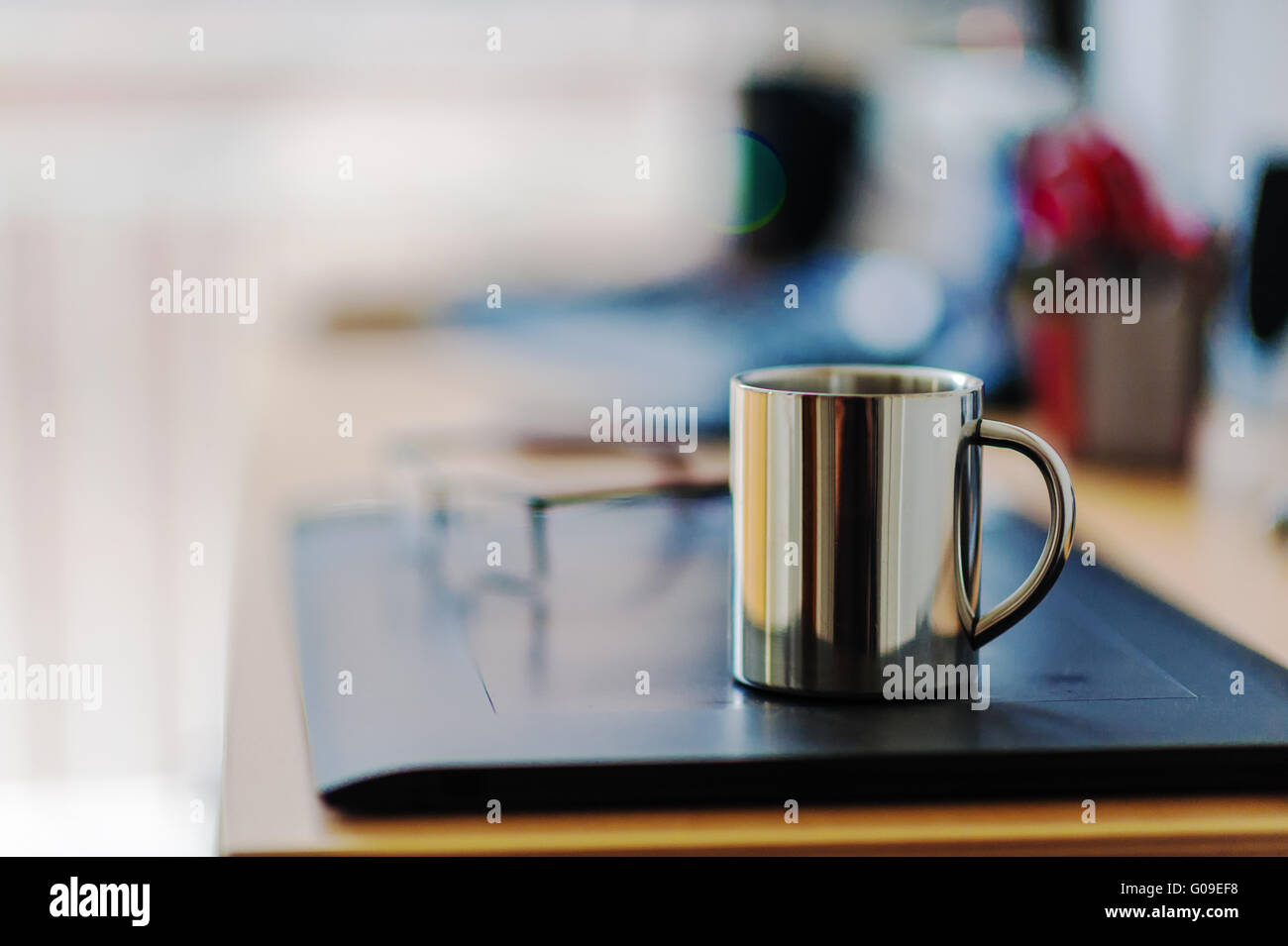 Office desk with coffee cup Stock Photo