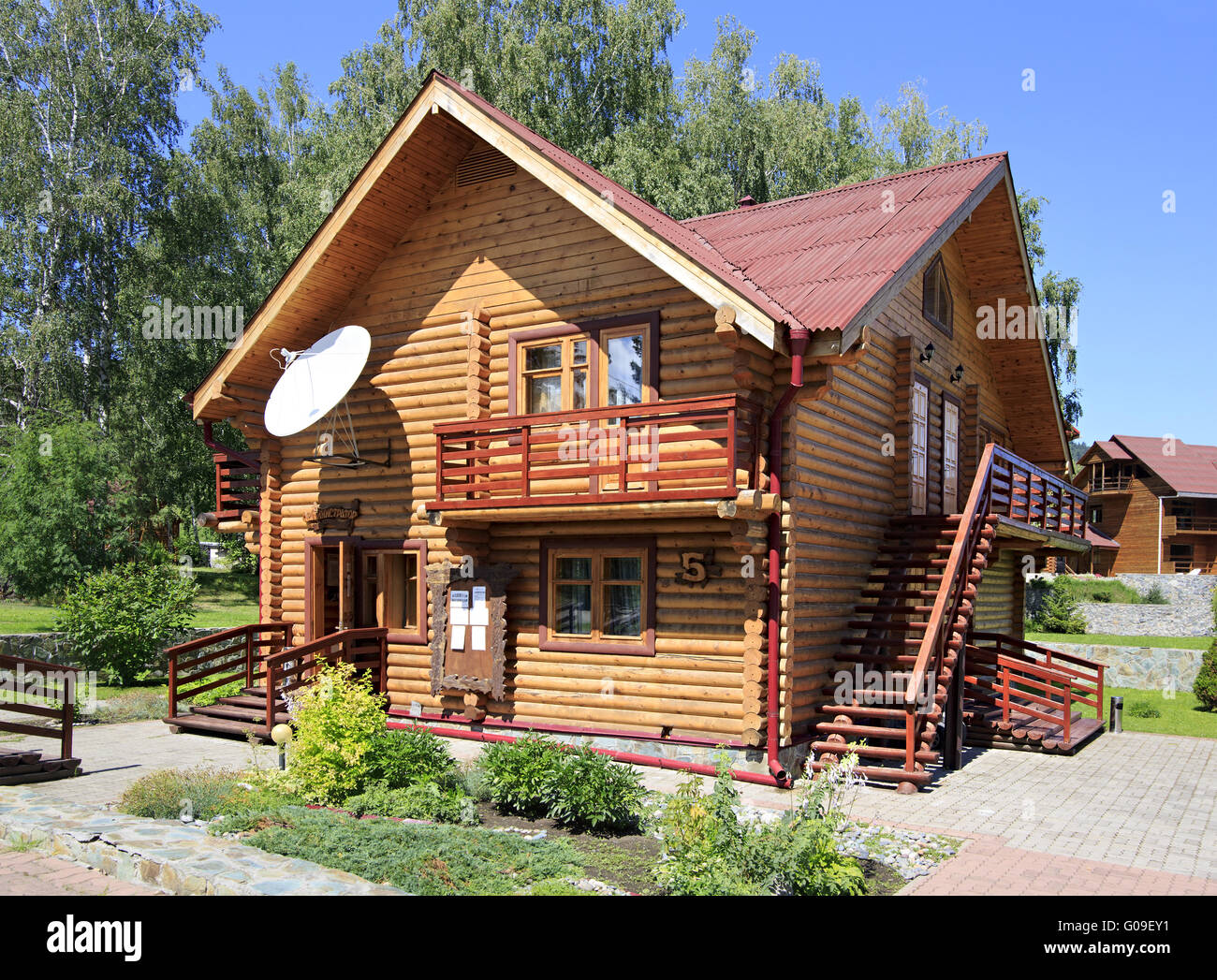 Beautiful wooden house in the mountains. Altai. Russia Stock Photo - Alamy