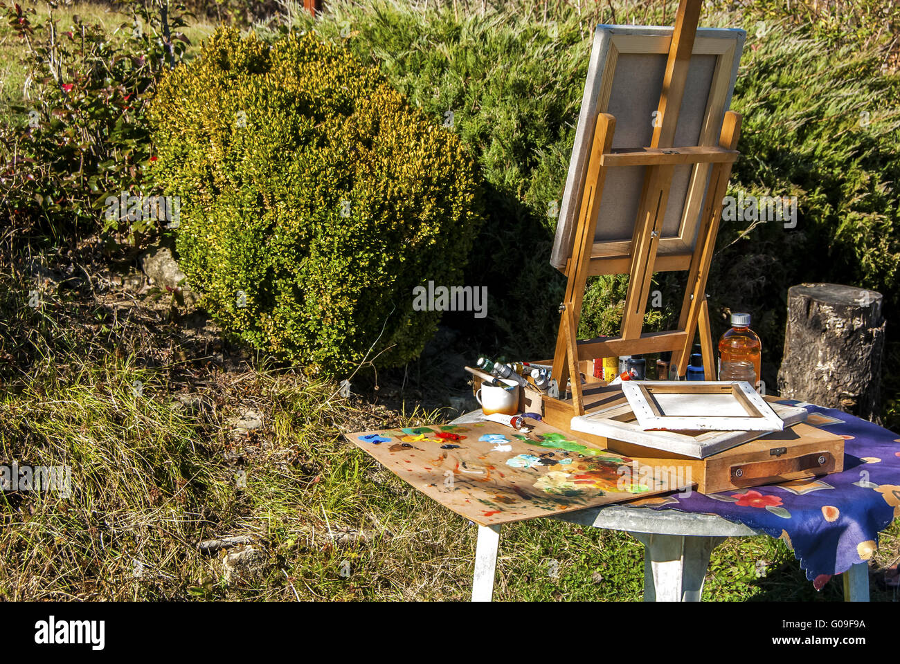 Tabletop easel for painting, palette, canvas, pain Stock Photo