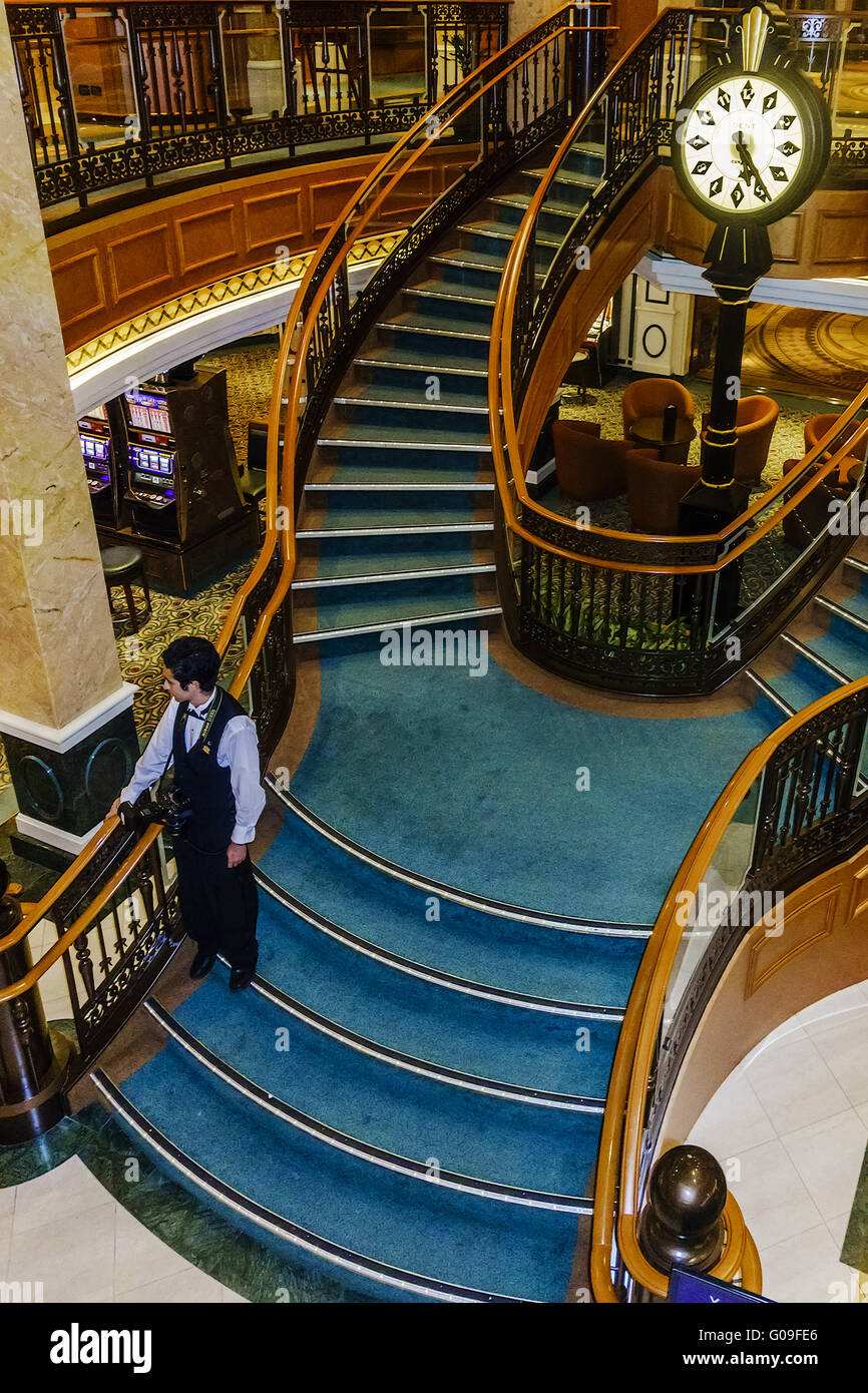 Ship Queen Elizabeth Midships Stairs and Clock Stock Photo