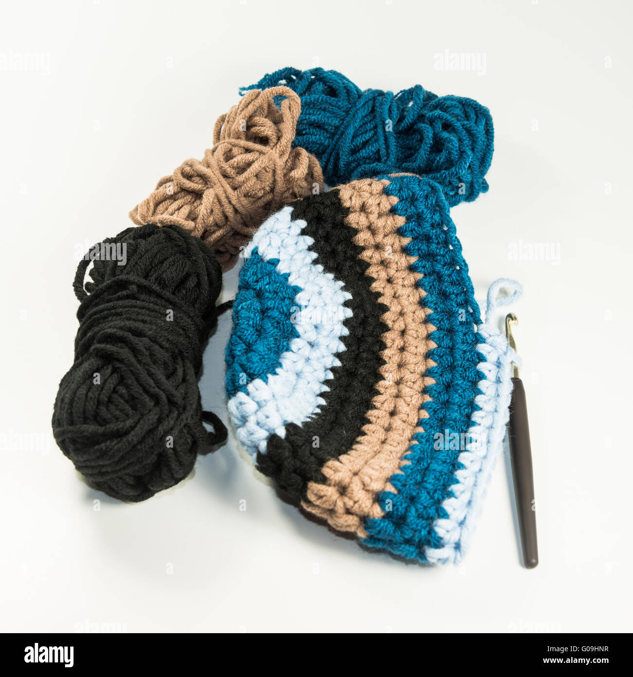 Wool hat, wool, crochet hook Stock Photo
