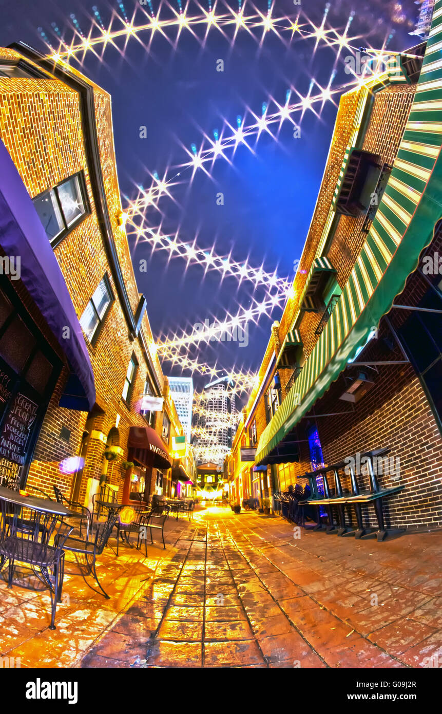 charlotte, nc - january 1st, 2014: Night view of a narrow alley street with restaurants in charlotte, nc Stock Photo