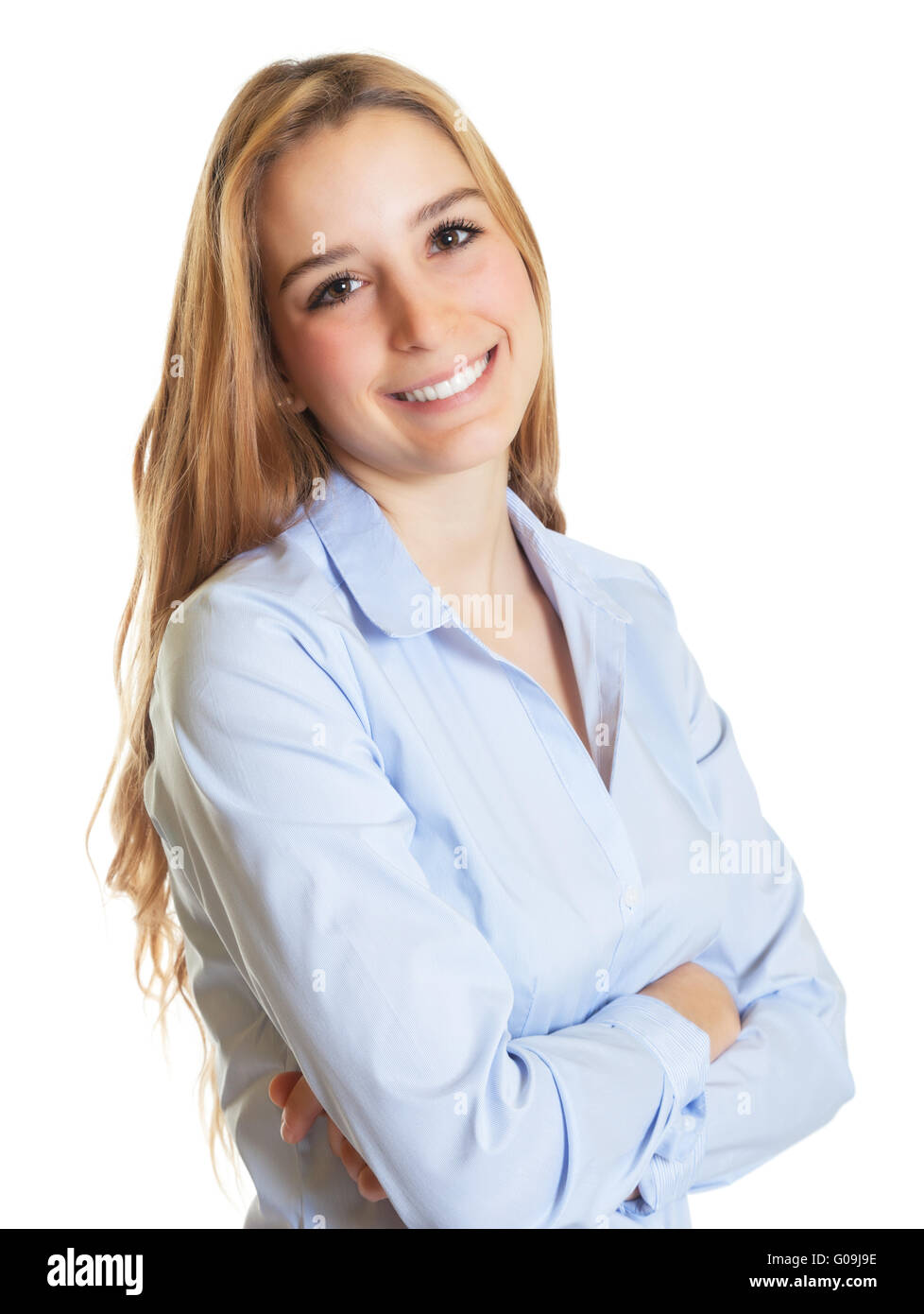 Female secretary with blond hair and crossed arms Stock Photo