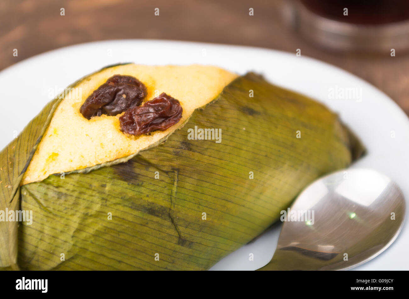 Two raisins in the middle of quimbolito, traditional of Ecuador Stock Photo