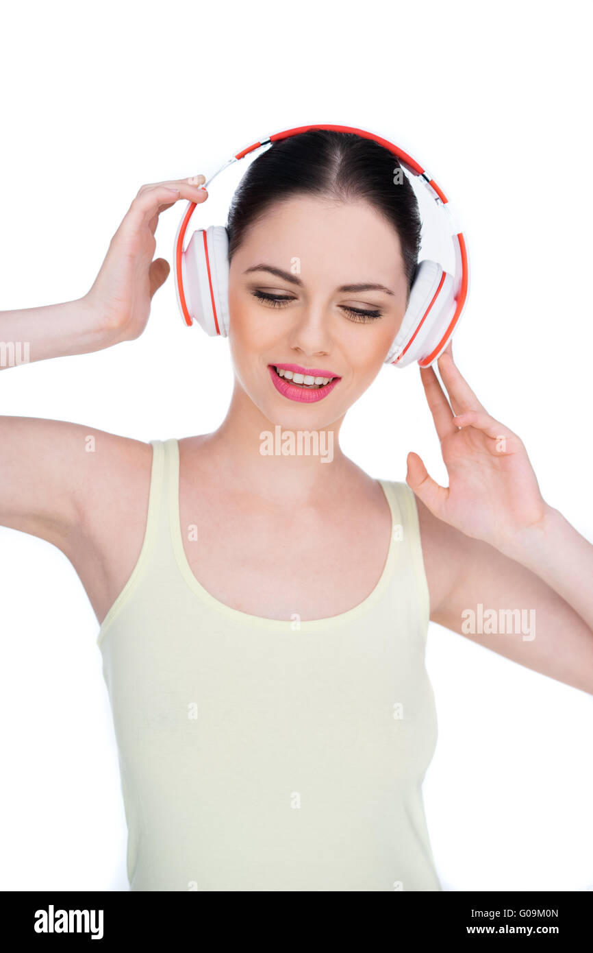 Happy young woman listening to music Stock Photo - Alamy