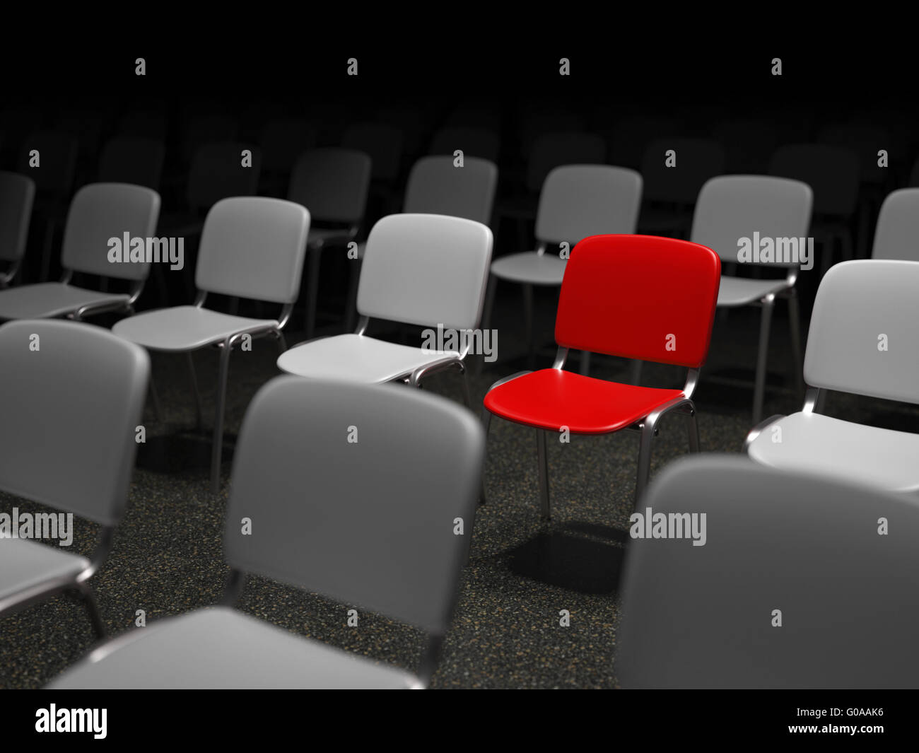 Group of chairs with a red chair standing out Stock Photo Alamy