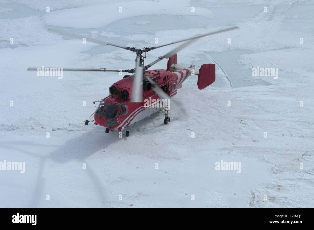 helicopter in the sea of antarctic Stock Photo