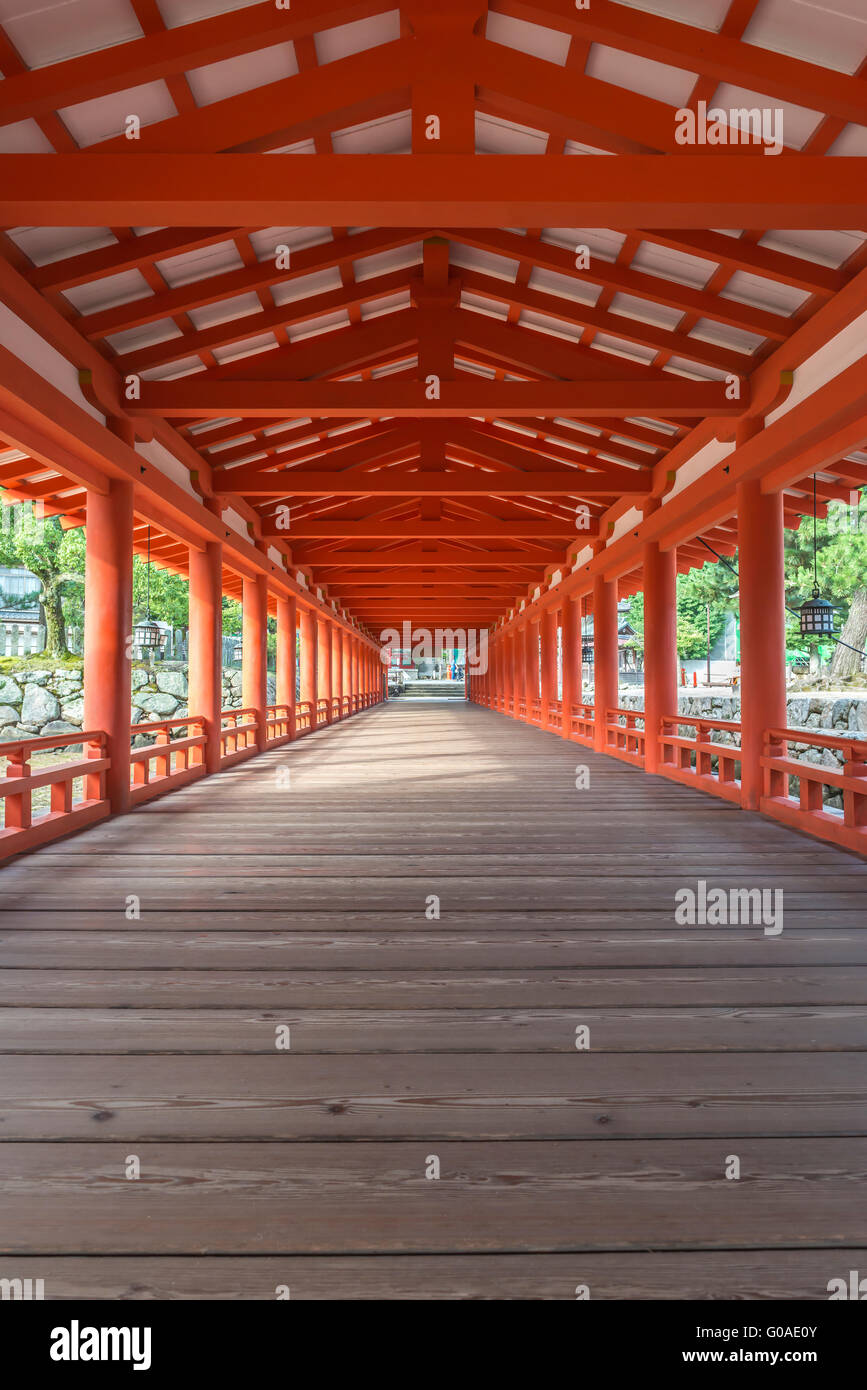 Early morning looking down a long corridor  at the famous the Itsukushima Shrine on Miyajima Stock Photo