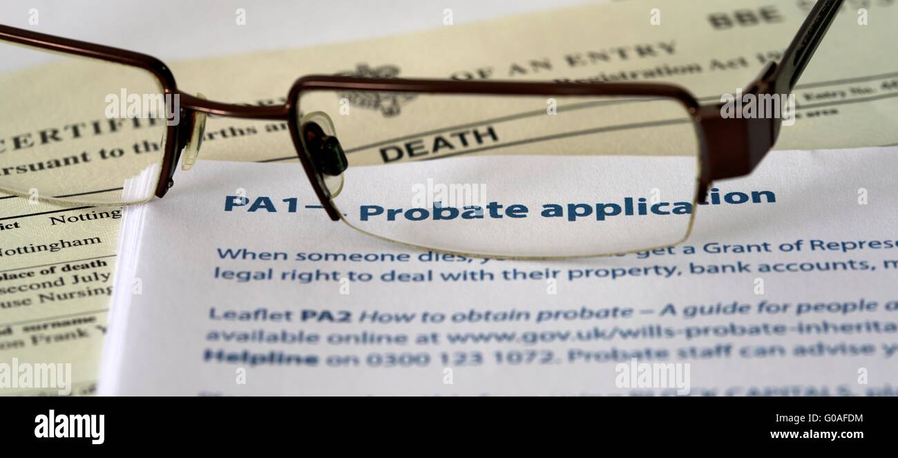 death certificate and PA1 probate application form with a pair of