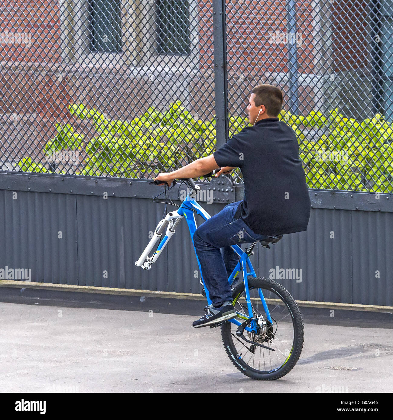 Riding A Bike With One Wheel Copenhagen Denmark Stock Photo