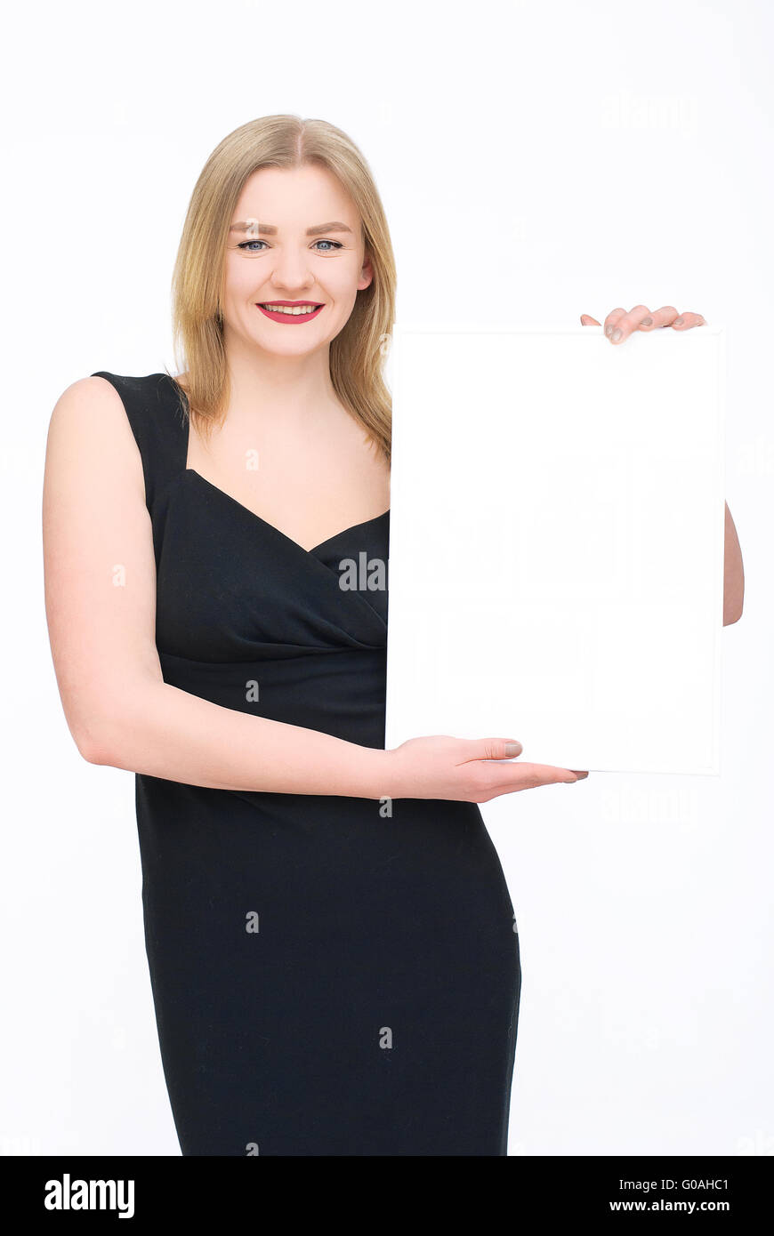 Woman in black dress Stock Photo - Alamy