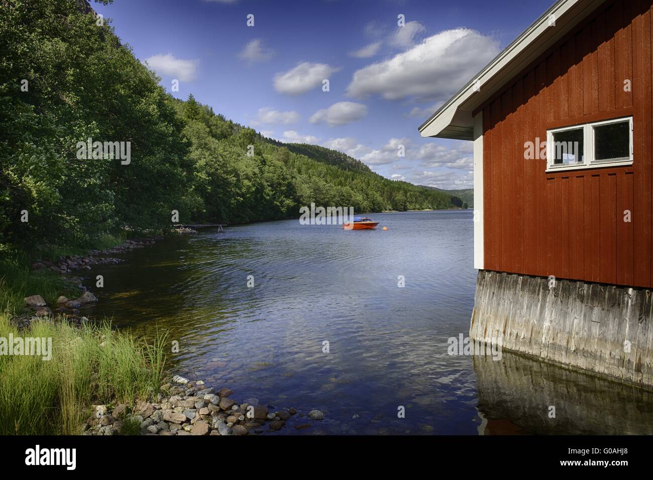 Typical red wooden house in Sweden Stock Photo - Alamy
