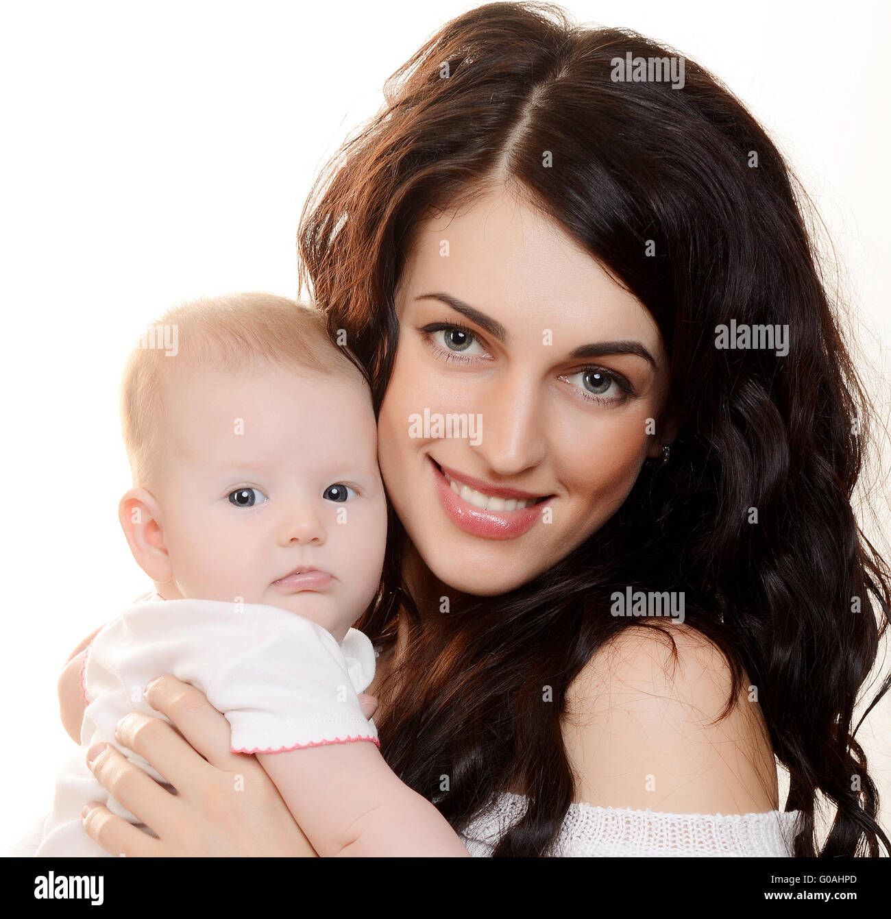 The happy mother with baby on white background Stock Photo