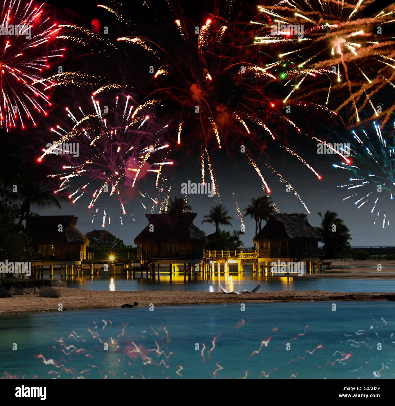 New Year's fireworks over the tropical island Stock Photo Alamy