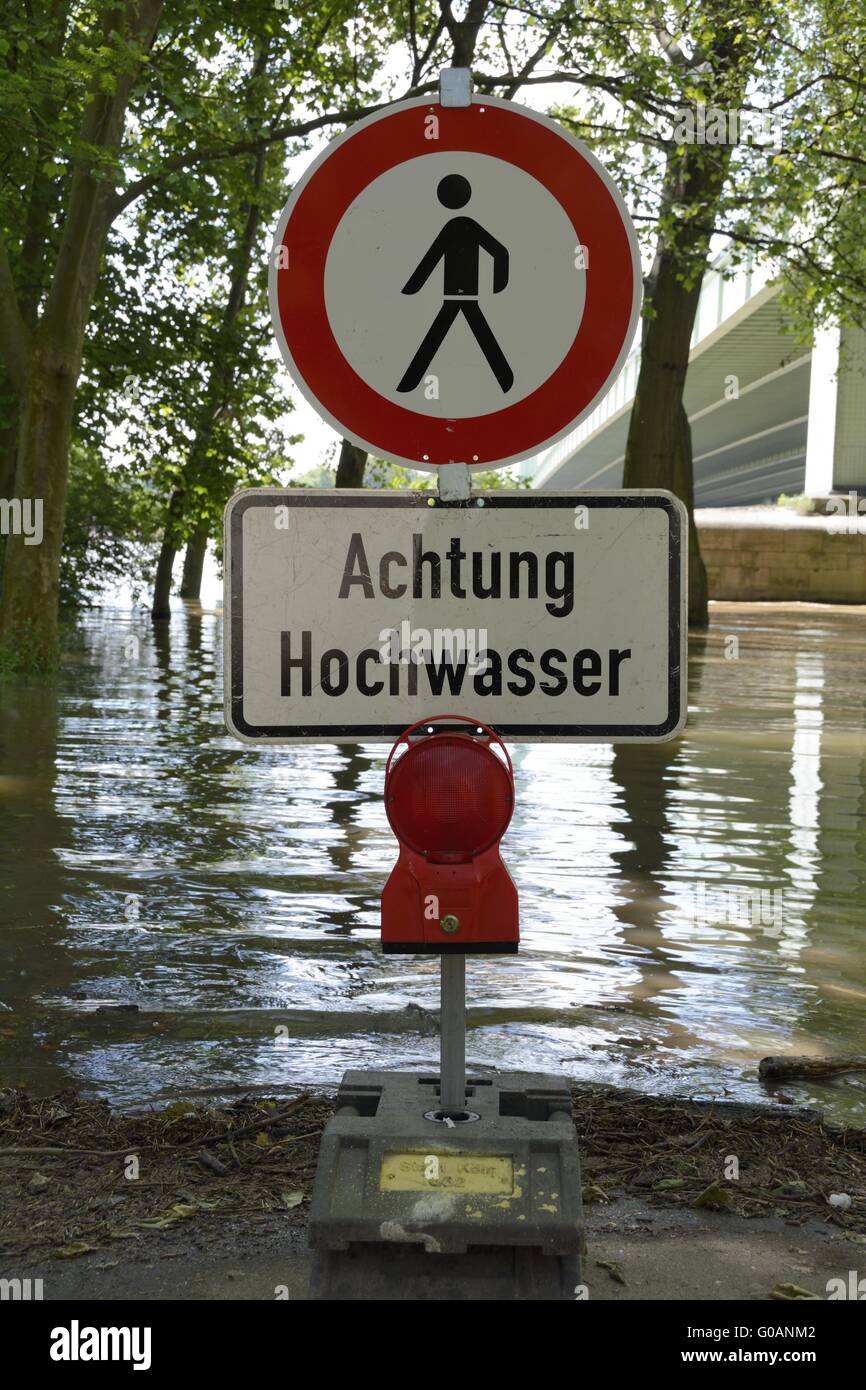 Caution High Water, german sign with red warning Stock Photo