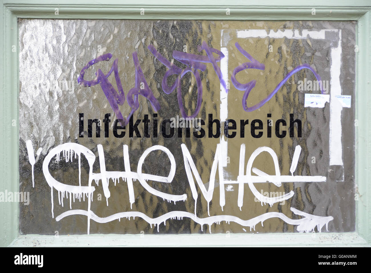 Infection area, glass with graffiti CHeMIe Stock Photo