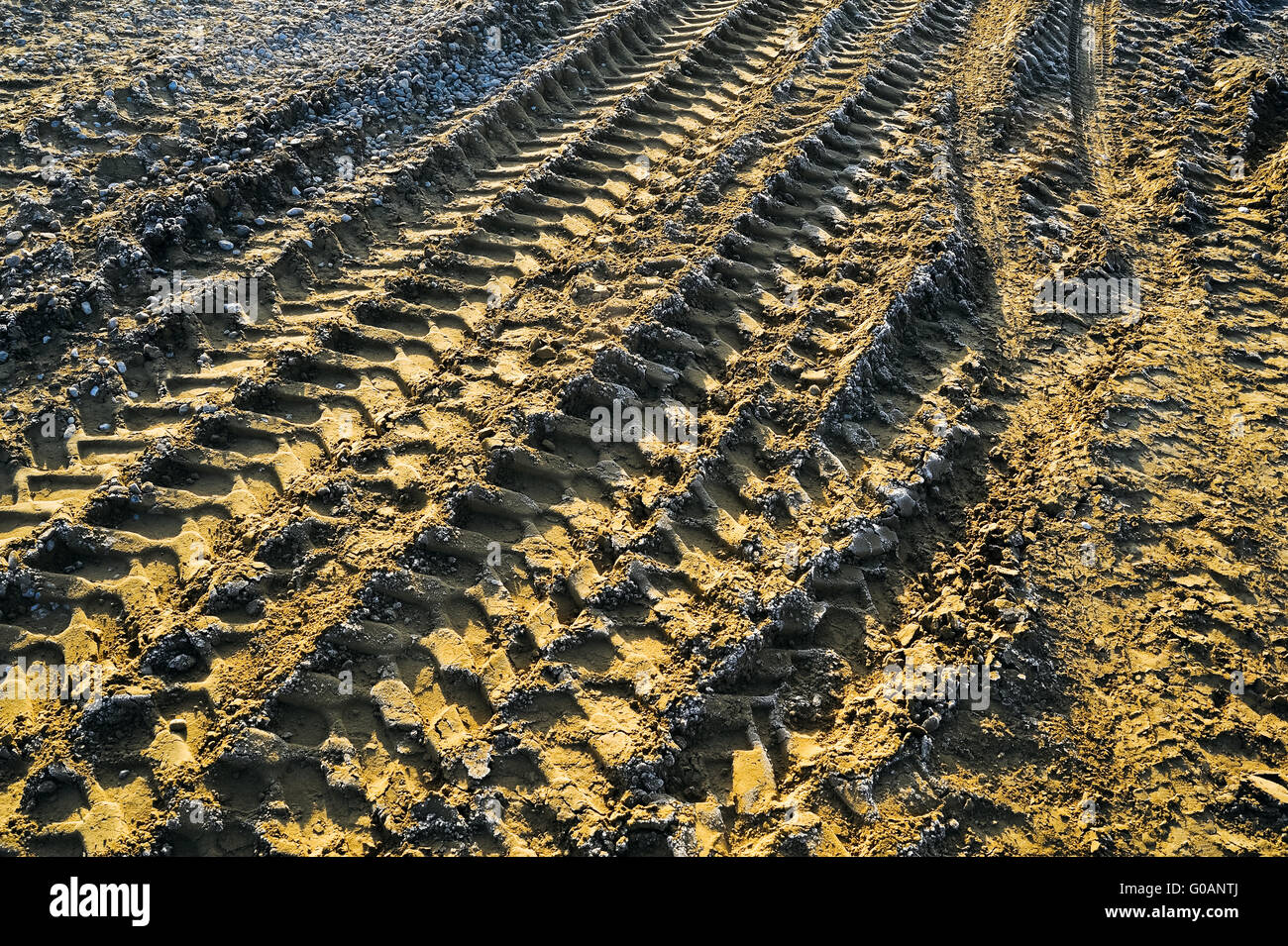 Tire track in the sand at a construction site Stock Photo