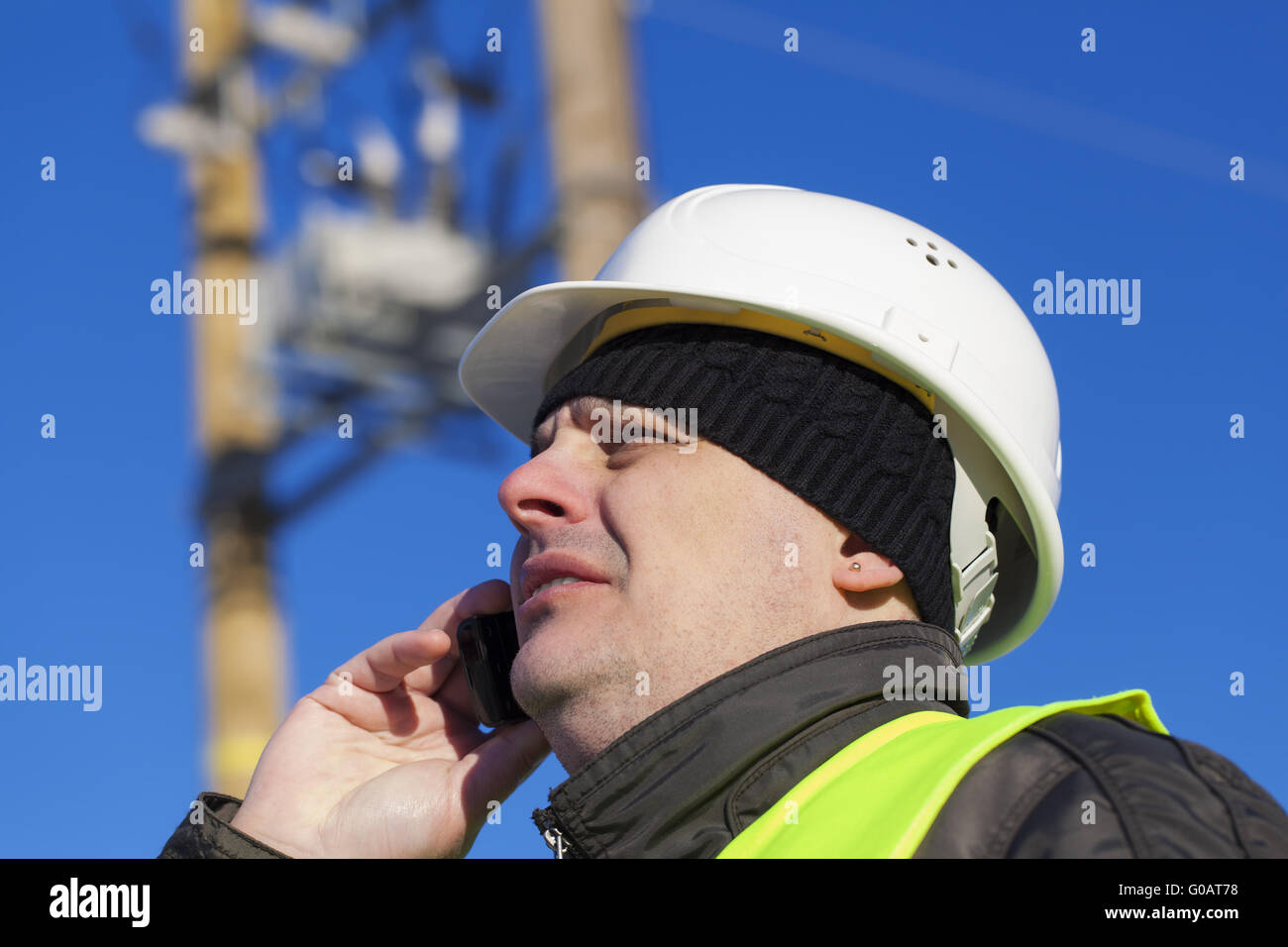 Electrical Engineer with cell phone near transfor Stock Photo Alamy Electrical Engineer with cell phone near transfor Stock Photo Alamy