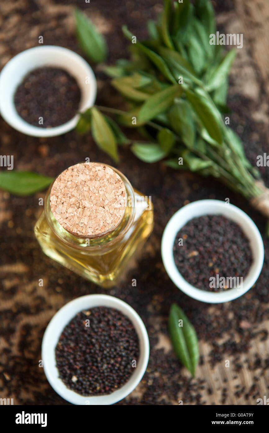 oil in a vessel with seeds Stock Photo Alamy