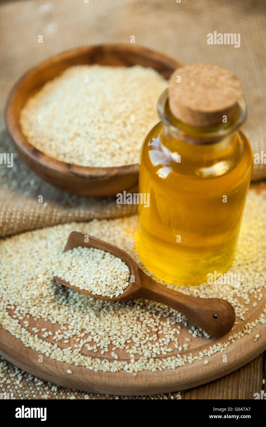 sesame oil and sesame seeds Stock Photo