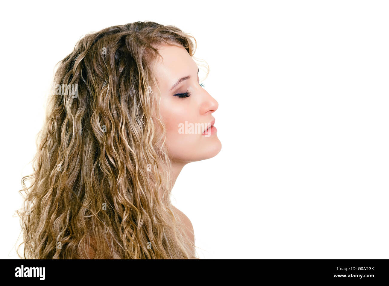 portrait of a beautiful young girl with long blond wavy hair Stock ...