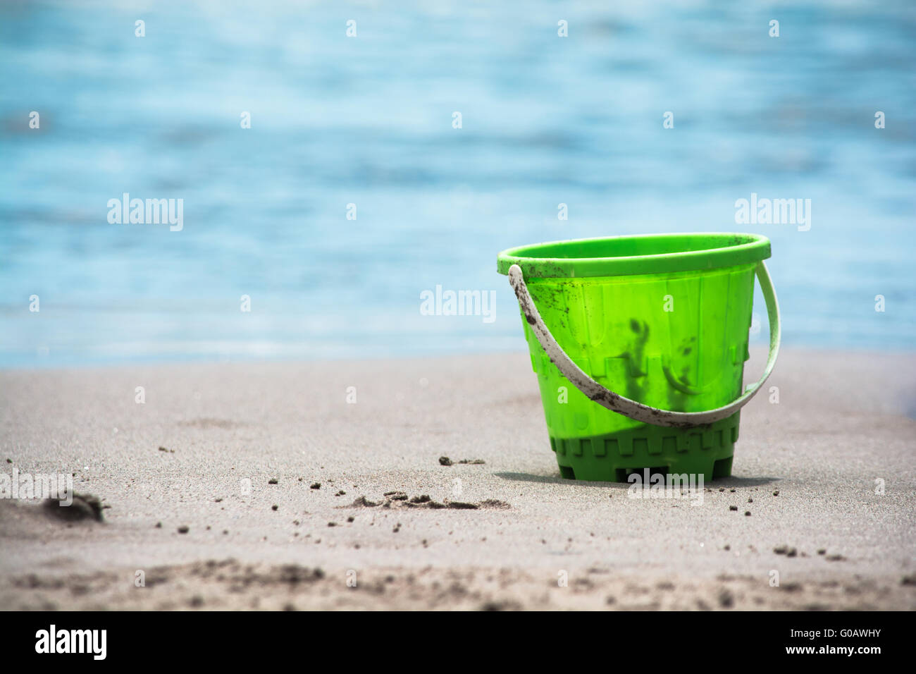 Bucket at the beach Stock Photo Alamy