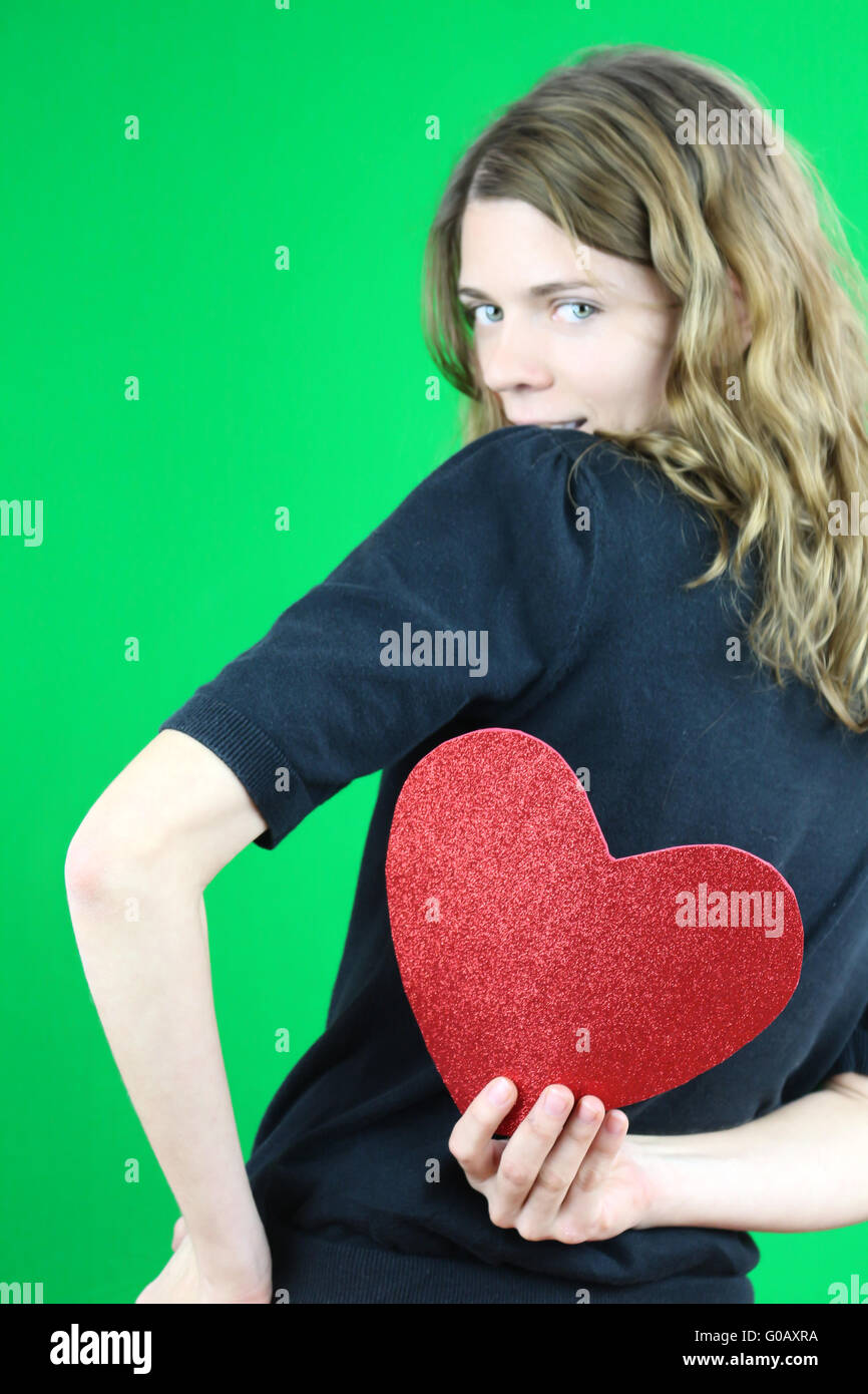 Holding a Heart Stock Photo