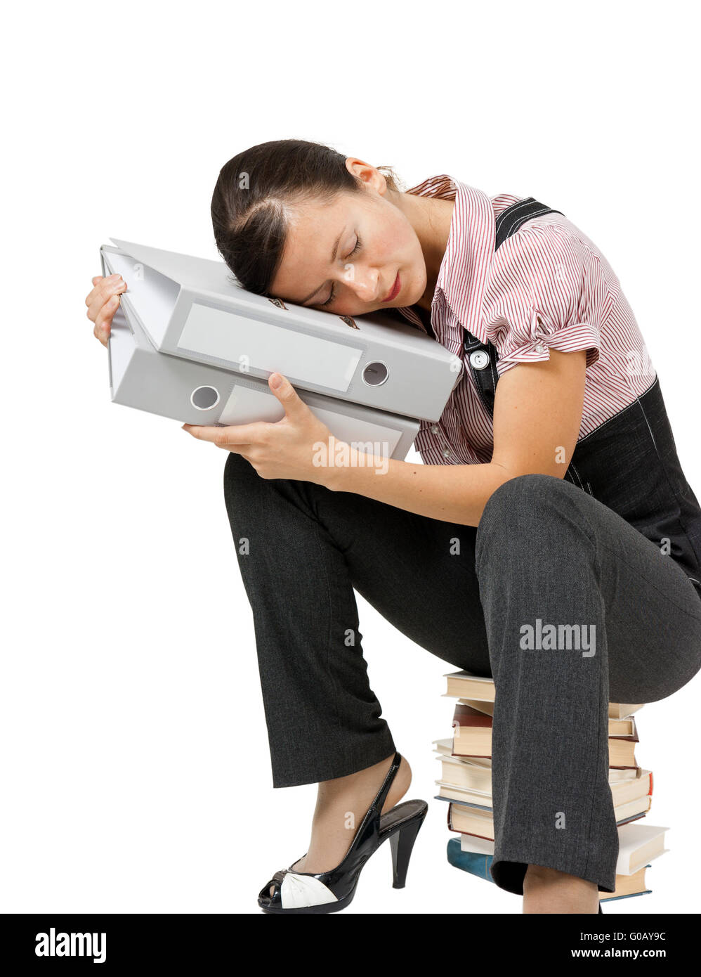 woman sleeping on the books. Tired office worker Stock Photo - Alamy