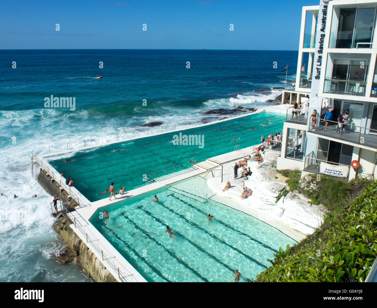 People swimming in the Bondi Icebergs Club's swimming pool at Bondi Beach, Sydney. Stock Photo
