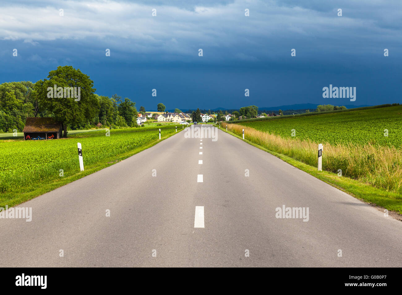 View of countryside road after thunder storm, near Schaffhausen Switzerland Stock Photo