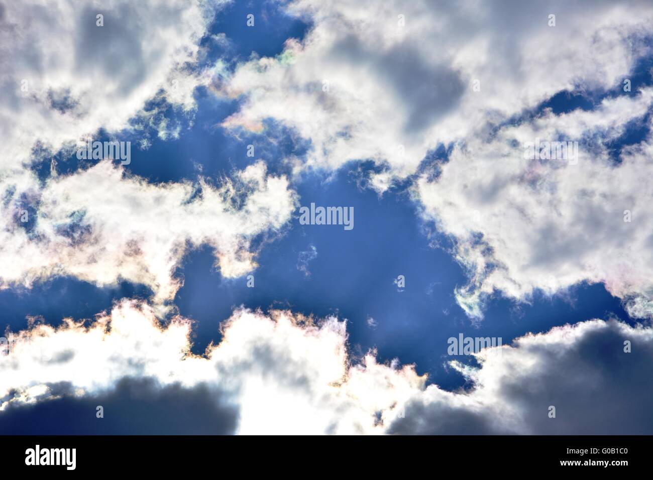 Blue sky with clouds and birds flying away Stock Photo - Alamy