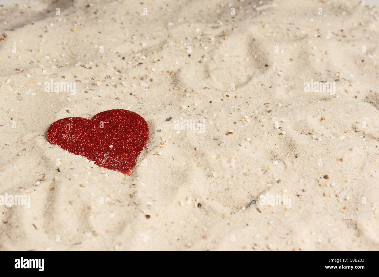 Red Heart On Sandy Beach Word Stock Photo 1161487648