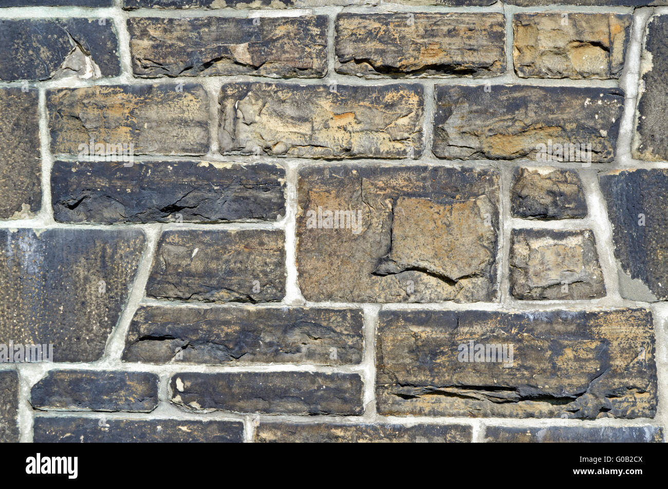 Old solid stone wall Stock Photo