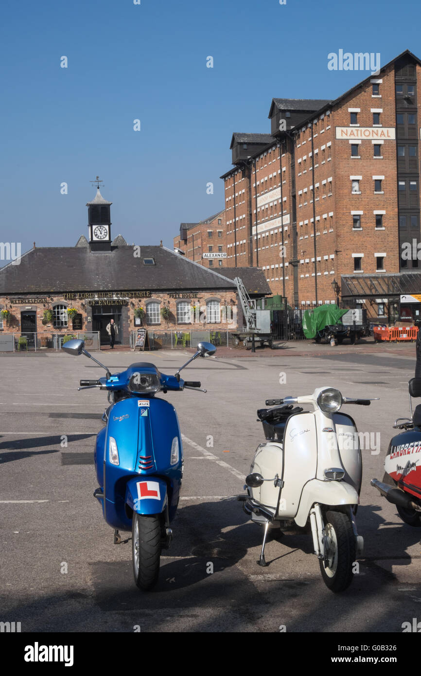 Motor scooters at Gloucester docks in southern England Stock Photo Alamy