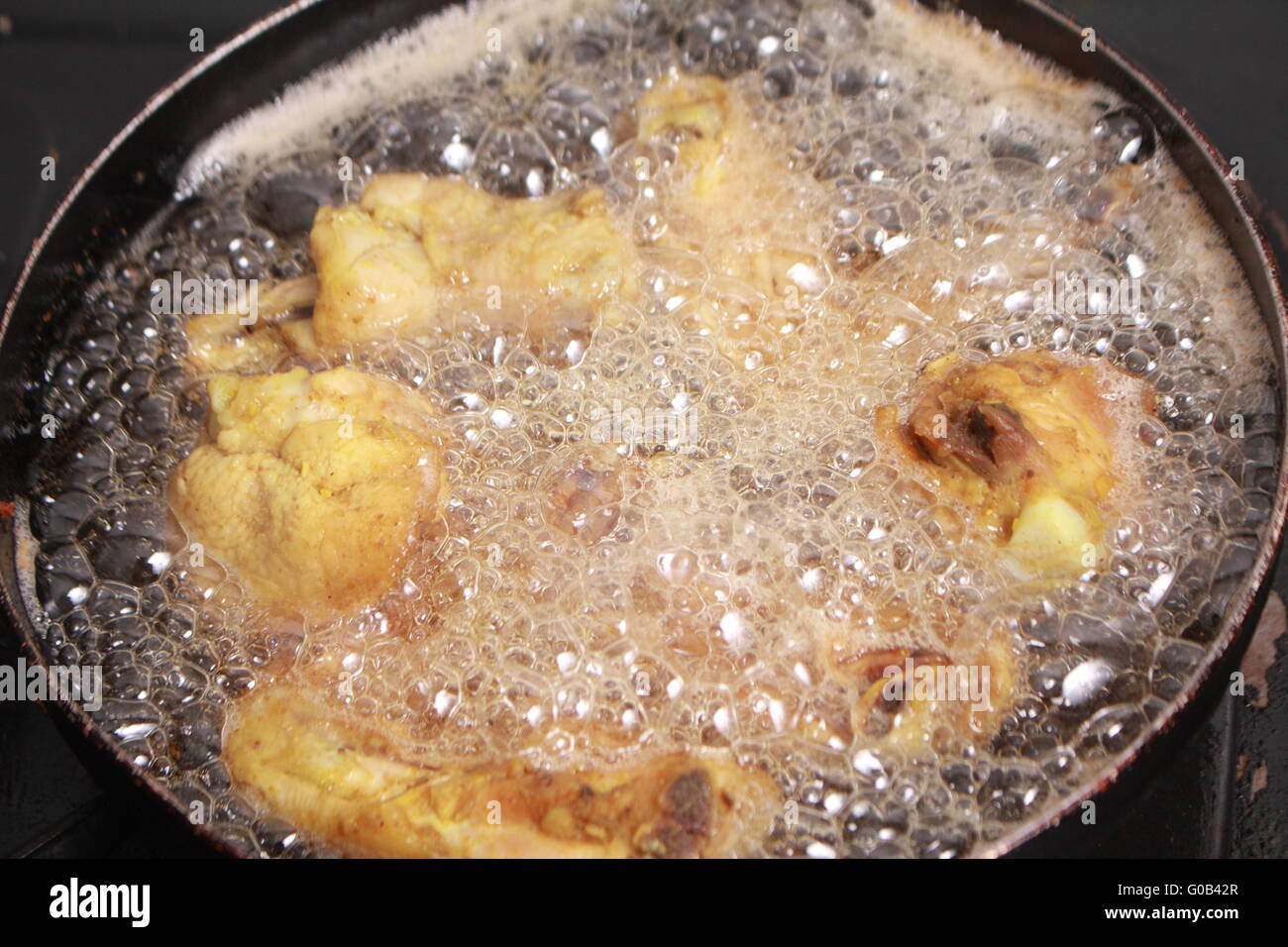 Close up image of cooking chicken in deep fry Stock Photo Alamy